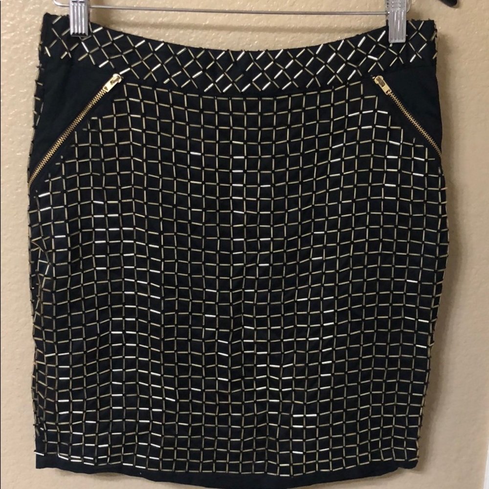 Beautiful black skirt with gold sequins